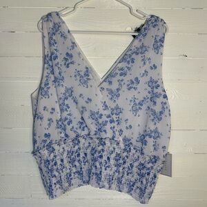 1.State Blue and white women’s sleeveless floral blouse, size XL. White & blue.